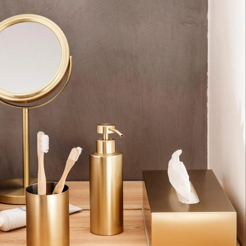 Dispensador de baño de acero inoxidable dorado