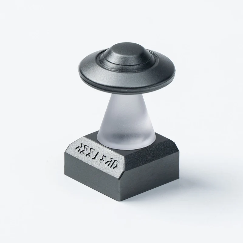 UFO artesanal de aleación de aluminio para teclas